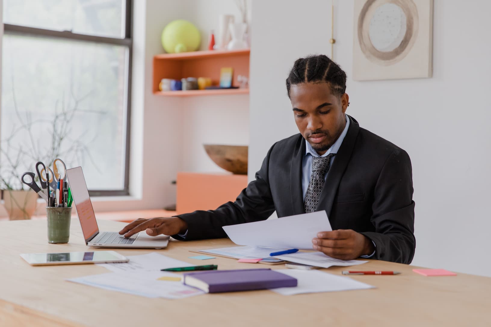 Property agent exchanging documents with a tenant